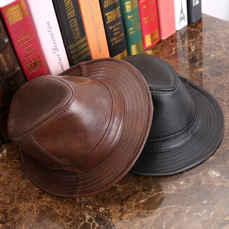 Men's And Women's Cowhide Hats With Big Eaves On The Street Image