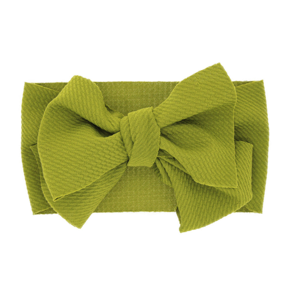 New-born baby's solid-colored bow headband Image