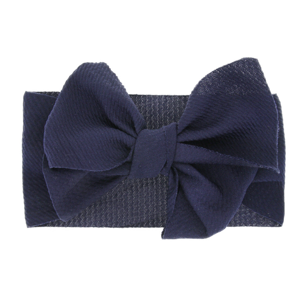 New-born baby's solid-colored bow headband Image