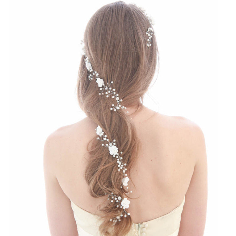 Bride's wedding photo building with makeup handmade pearl white flowers and long soft chain hair chain 1 meters 1 Image