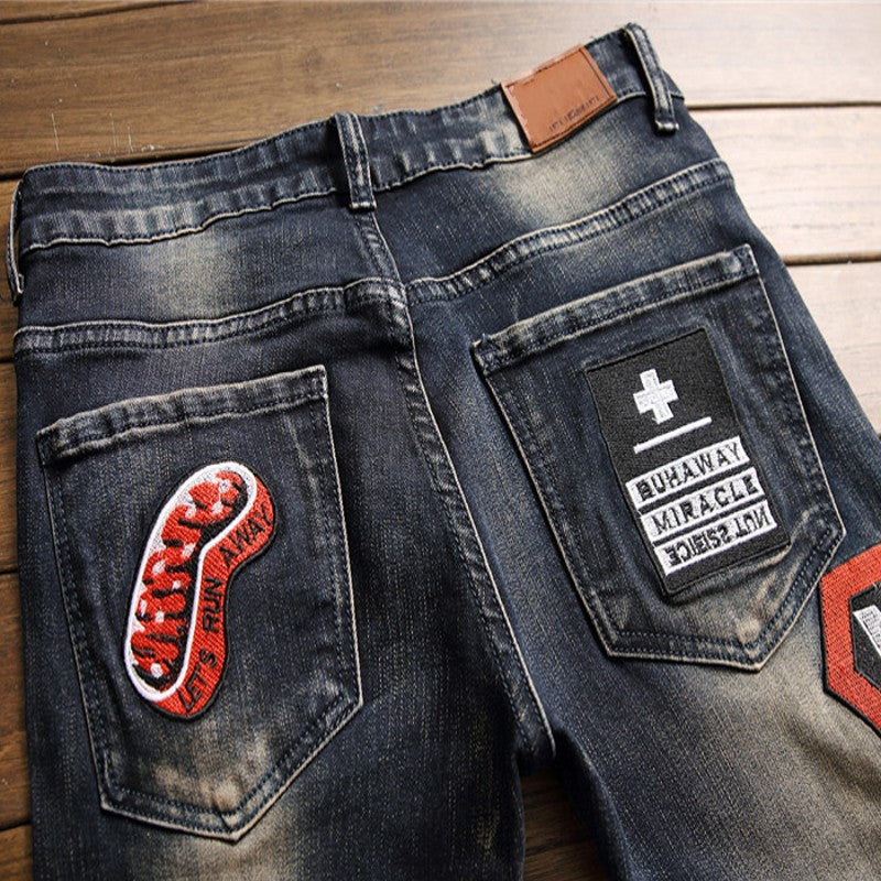 Ripped Jeans Men's Badge Patch Jeans Image