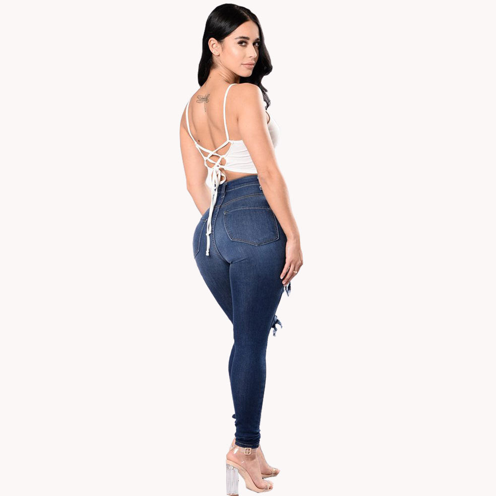 Women's ripped jeans pants Image