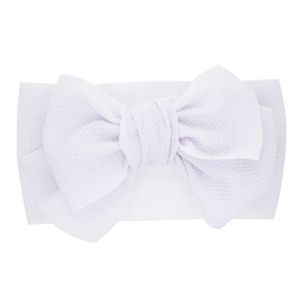 New-born baby's solid-colored bow headband Image