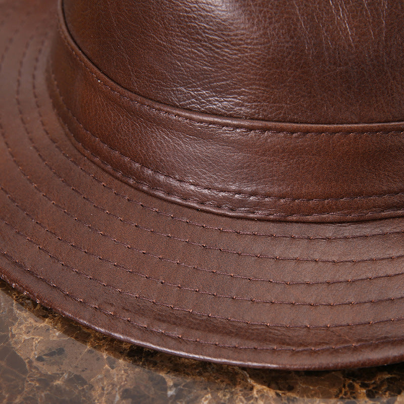 Men's And Women's Cowhide Hats With Big Eaves On The Street Image