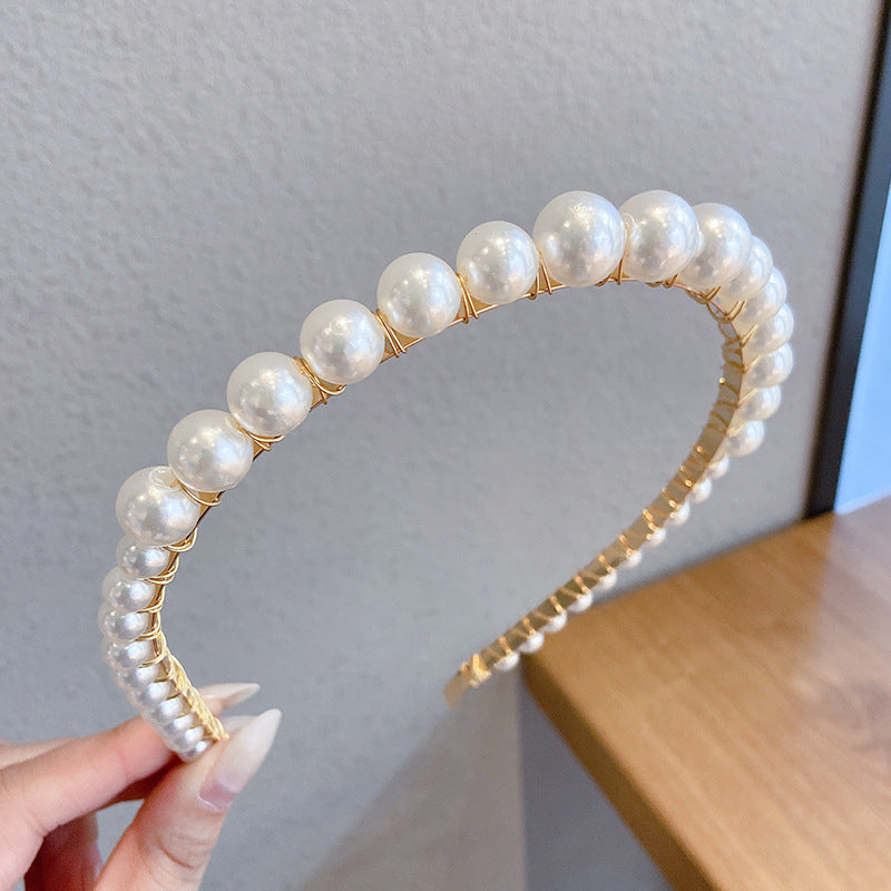 Thin pearl headband Image